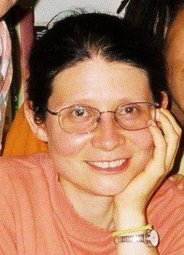 Adriana Mugnatto-Hamu with her head on her hand