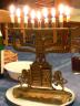 Chanukah menorah on blue tablecloth